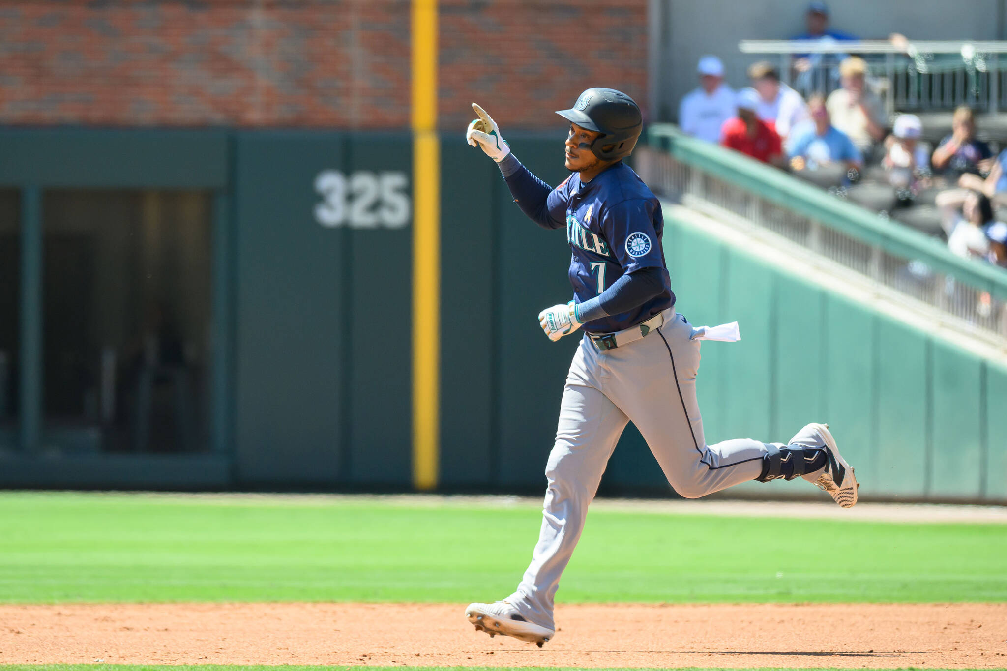 Jorge Polanco (7) of the Seattle Mariners runs to second base after hitting a two-run home run in the third inning of a game against the Atlanta Braves at Truist Park on Sunday, Sept. 7, 2025, in Atlanta. (Edward M. Pio Roda / Getty Images / Tribune News Services)