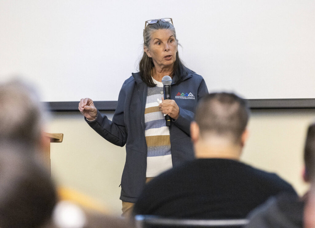 Linda Neunzig speaks during an informational open house on Oct. 9, 2025 in Everett, Washington. (Olivia Vanni / The Herald)
