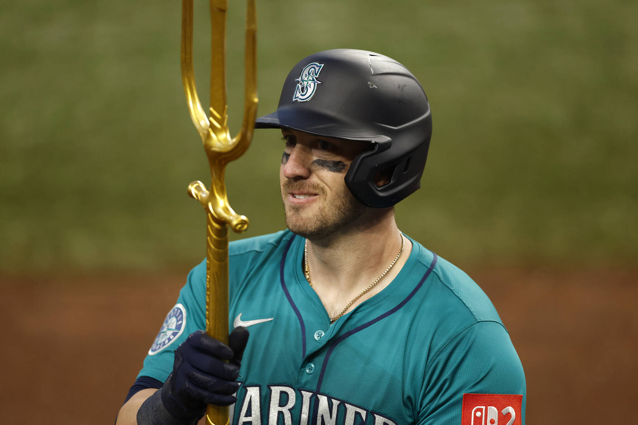 Mitch Garver (18) of the Seattle Mariners celebrates after hitting a two-run home run against the Texas Rangers during the 12th inning at Globe Life Field on Sunday, June 29, 2025, in Arlington, Texas. (Ron Jenkins / Getty Images / Tribune News Services)