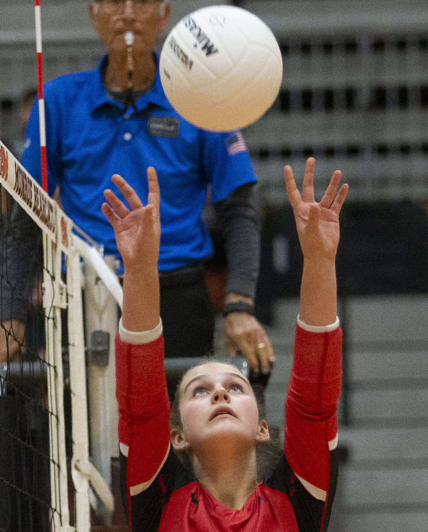Snohomish’s Maggie Cavanaugh sets the ball during the game against Monroe on Wednesday, Oct. 16, 2024 in Monroe, Washington. (Olivia Vanni / The Herald)