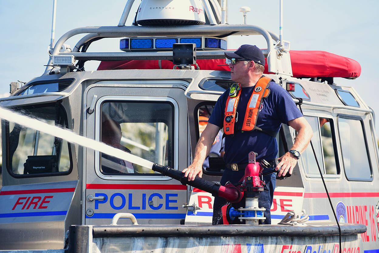 Marine 16, a fire and rescue boat based at the Port of Edmonds, uses streams of water directly from the bay to wash away the droppings. (South County Fire)