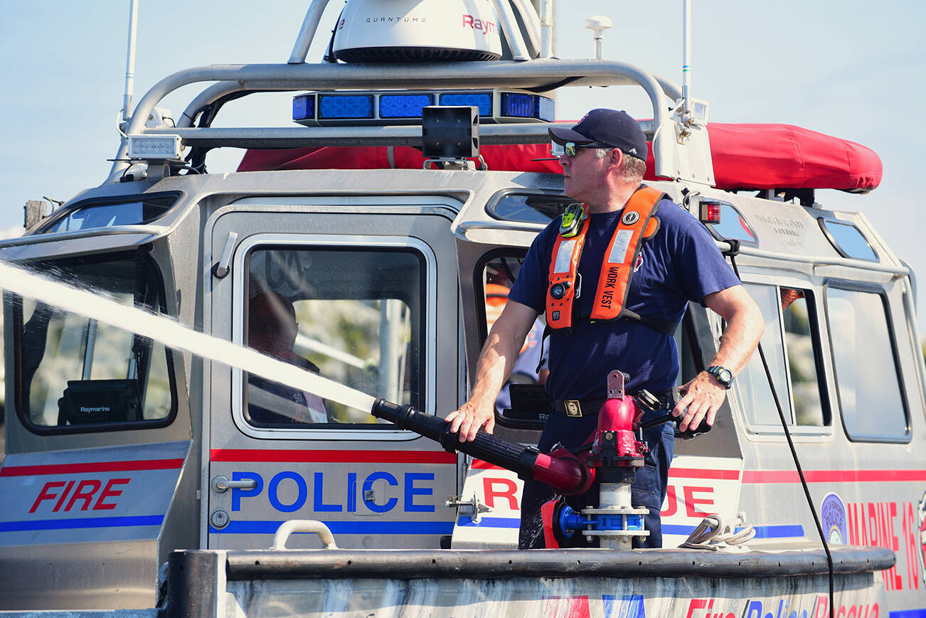 Marine 16, a fire and rescue boat based at the Port of Edmonds, uses streams of water directly from the bay to wash away the droppings. (South County Fire)