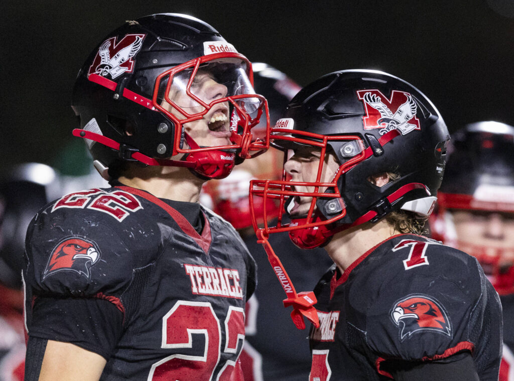 Mountlake Terrace’s Owen Boswell celebrates his touchdown with teammate Andrew McBride during the game against Edmonds-Woodway on Oct. 23, 2025 in Edmonds, Washington. (Olivia Vanni / The Herald)
