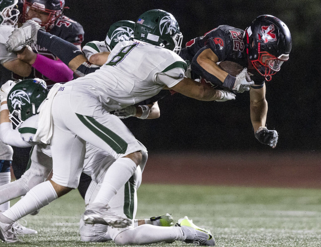 Mountlake Terrace’s Owen Boswell jumps to try and escape a tackle during the game against Edmonds-Woodway on Oct. 23, 2025 in Edmonds, Washington. (Olivia Vanni / The Herald)

