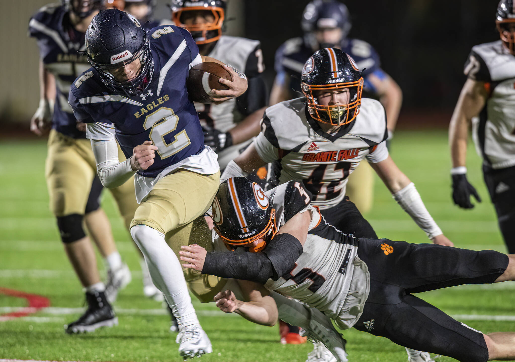 Granite Falls Beau Everson tackles Cedar Park Christians Tre Samuelu during the game on Oct. 24, 2025 in Kirkland, Washington. (Olivia Vanni / The Herald)