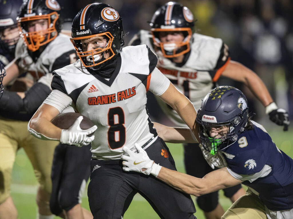 Granite Falls’ Drake Smith runs the ball into the end zone for a touchdown during the game against Cedar Park Christian on Oct. 24, 2025 in Kirkland, Washington. (Olivia Vanni / The Herald)
