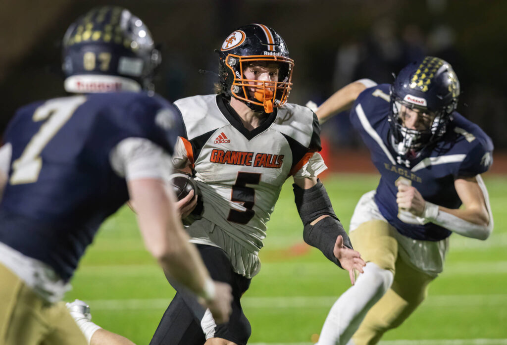 Granite Falls’ Beau Everson runs the ball during the game against Cedar Park Christian on Oct. 24, 2025 in Kirkland, Washington. (Olivia Vanni / The Herald)