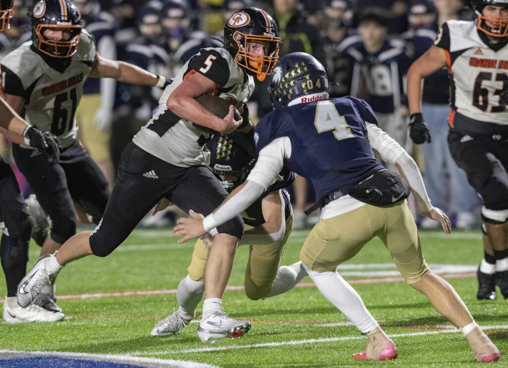 Granite Falls’ Beau Everson runs the ball during the game against Cedar Park Christian on Oct. 24, 2025 in Kirkland, Washington. (Olivia Vanni / The Herald)