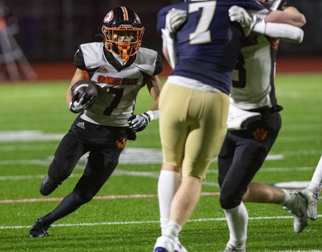 Granite Falls’ Gino Howard runs the ball during the game against Cedar Park Christian on Oct. 24, 2025 in Kirkland, Washington. (Olivia Vanni / The Herald)