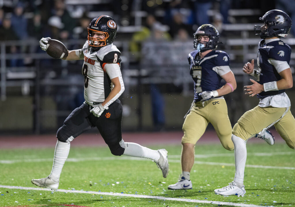 Granite Falls’ Drake Smith runs the ball into the end zone for a touchdown during the game against Cedar Park Christian on Oct. 24, 2025 in Kirkland, Washington. (Olivia Vanni / The Herald)
