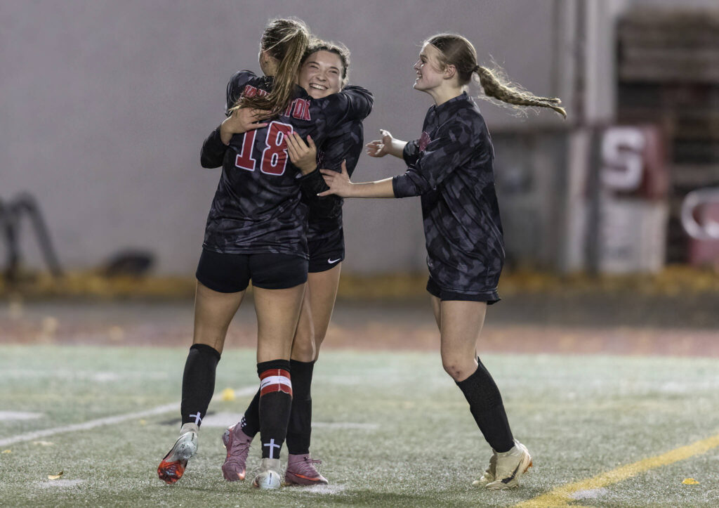 Snohomish’s Danica Avalos celebrates her goal with her teammates during the game against Stanwood on Oct. 27, 2025 in Snohomish, Washington. (Olivia Vanni / The Herald)