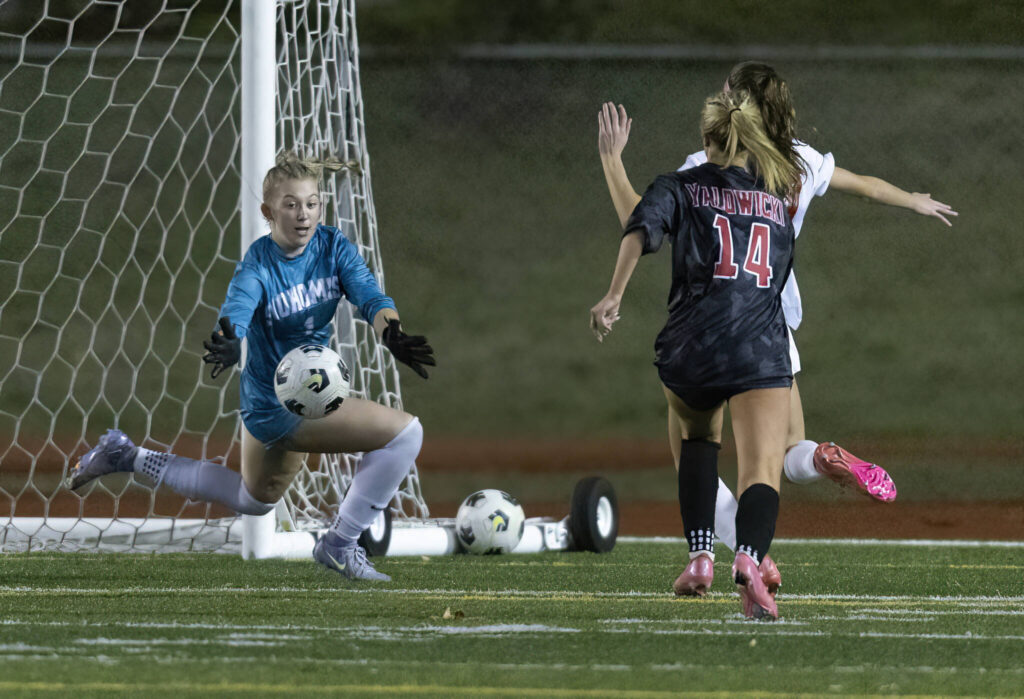 Snohomish’s Addison Carter runs out to stop a shot during the game against Stanwood on Oct. 27, 2025 in Snohomish, Washington. (Olivia Vanni / The Herald)