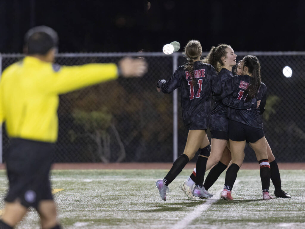 Snohomish’s Lizzie Allyn celebrates he goal with her teammates during the game against Stanwood on Oct. 27, 2025 in Snohomish, Washington. (Olivia Vanni / The Herald)