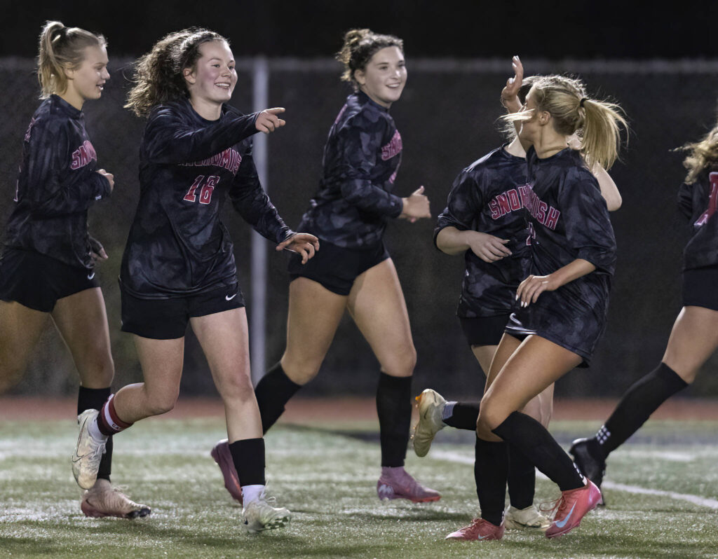 Snohomish’s Lizzie Allyn celebrates he goal with her teammates during the game against Stanwood on Oct. 27, 2025 in Snohomish, Washington. (Olivia Vanni / The Herald)
