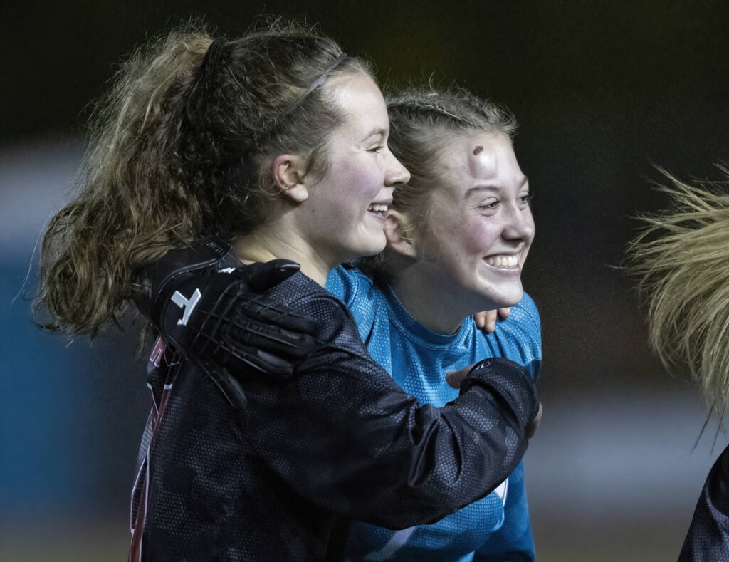 Snohomish’s Lizzie Allyn celebrates he goal with her teammates during the game against Stanwood on Oct. 27, 2025 in Snohomish, Washington. (Olivia Vanni / The Herald)