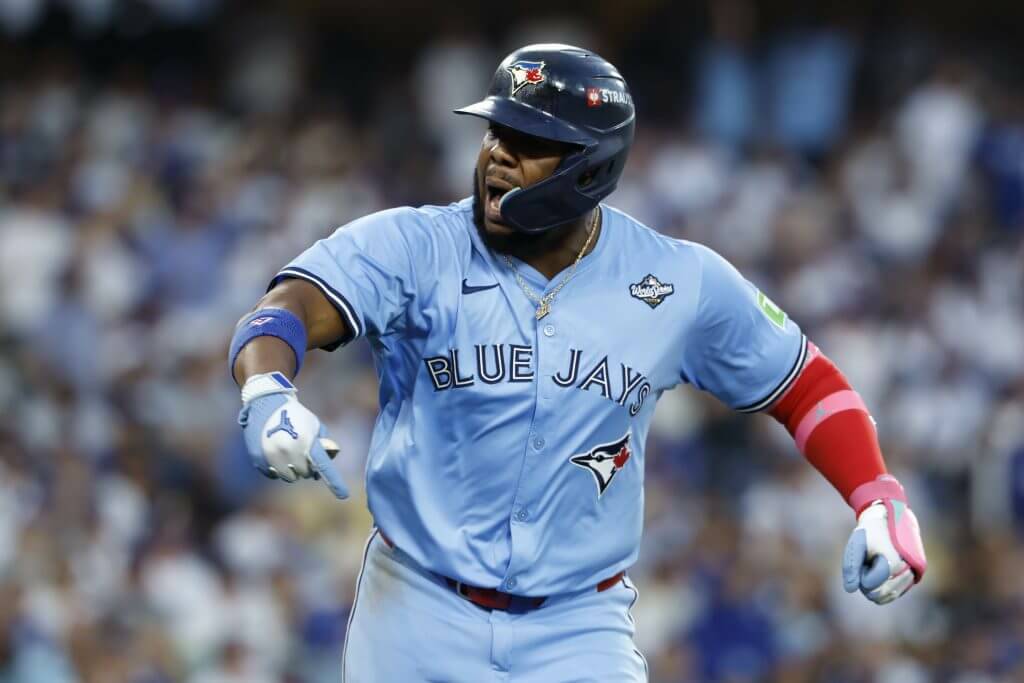 Vladimir Guerrero Jr. (27) of the Toronto Blue Jays celebrates after hitting a two-run home run in the third inning against the Los Angeles Dodgers in game four of the 2025 World Series at Dodger Stadium on October 28, 2025 in Los Angeles. (Photo by Ronald Martinez / Getty Images / The Athletic)