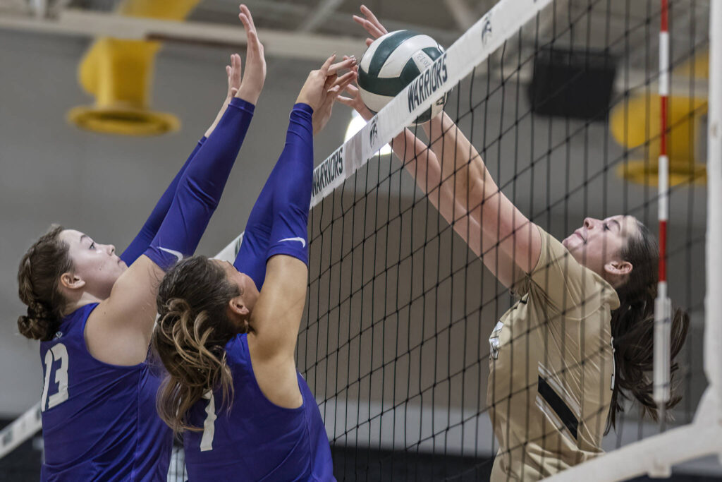 Edmonds-Woodway’s Bianca Binkley tips the ball over the top of the net during the game against Lynnwood on Oct. 29, 2025 in Edmonds, Washington. (Olivia Vanni / The Herald)
