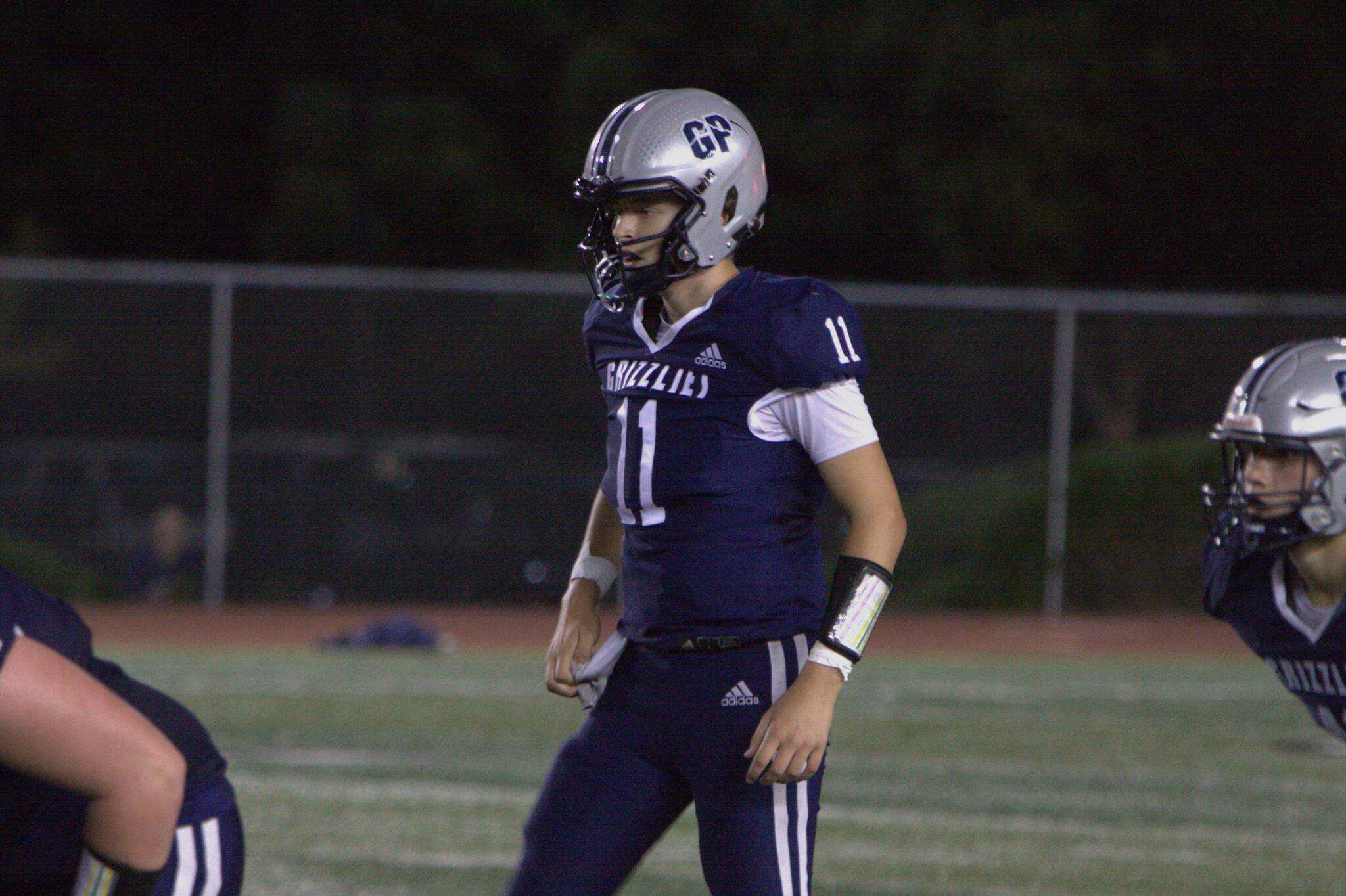 Glacier Peak quarterback Oliver Setterberg prepares for the snap during a non-league game against Snohomish on Friday, Sept. 12, 2025 at Veterans Memorial Stadium in Snohomish, Wash. (Qasim Ali / The Herald)