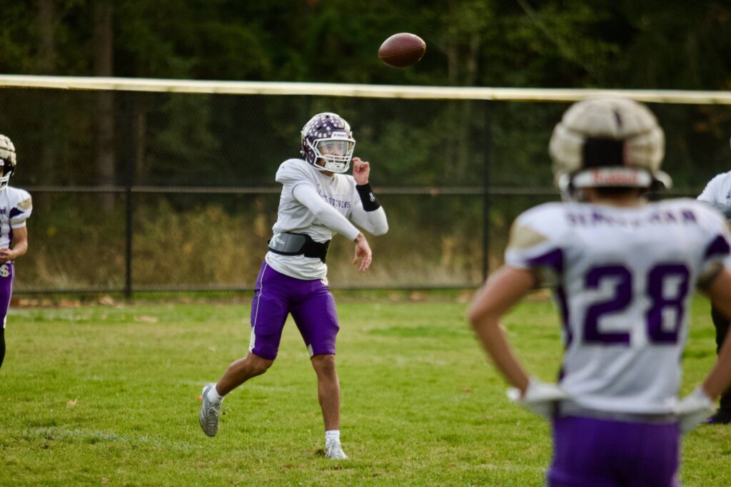 Lake Stevens junior Blake Moser releases the ball during a Vikings practice at Lake Stevens High School on Oct. 29, 2025. (Joe Pohoryles / The Herald)
