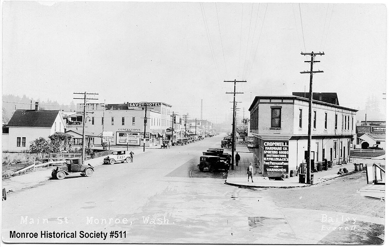 The Hallan Building and Main Street early in the 20th century. (Monroe Historical Society)