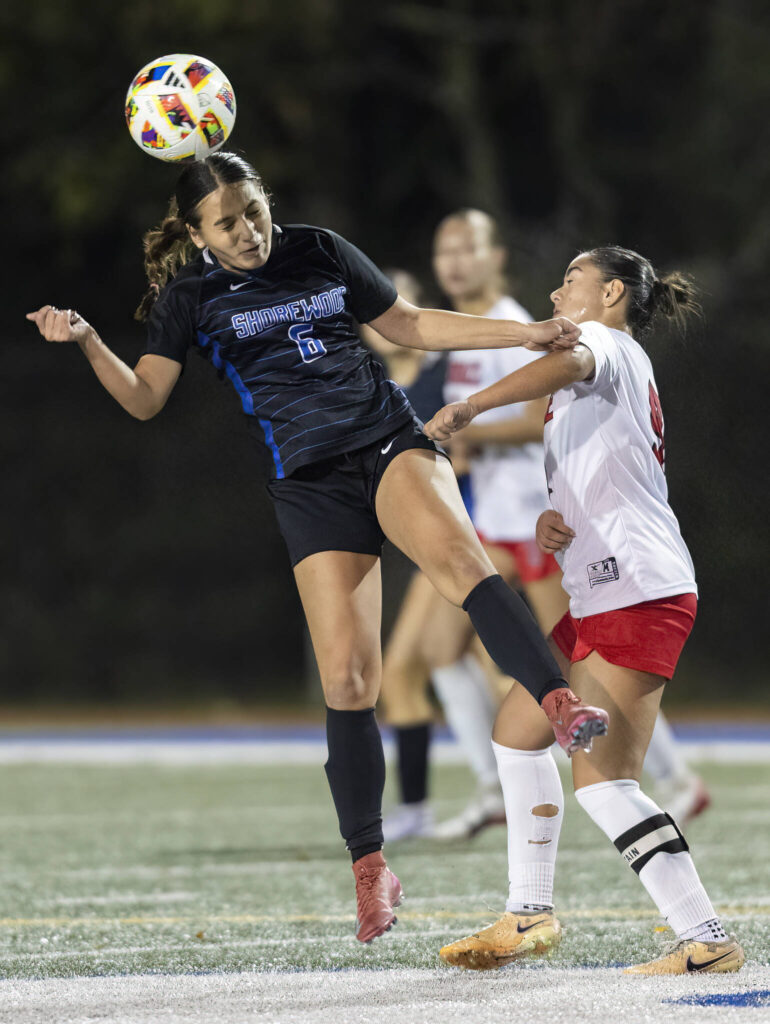 Shorewood’s McKenna Anderson heads the ball during the 3A district game against Mountlake Terrace on Oct. 30, 2025 in Shoreline, Washington. (Olivia Vanni / The Herald)
