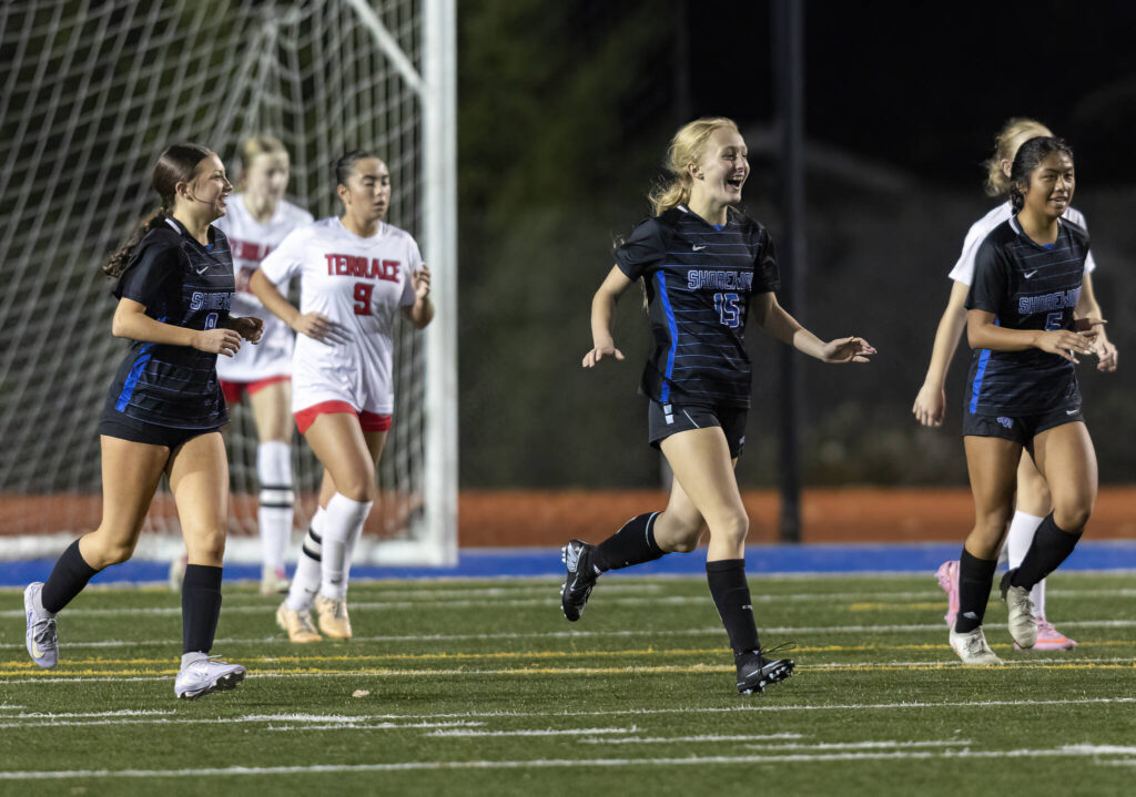 Shorewood’s Siena Lorentz celebrates scoring a goal during the 3A district game against Mountlake Terrace on Oct. 30, 2025 in Shoreline, Washington. (Olivia Vanni / The Herald)
