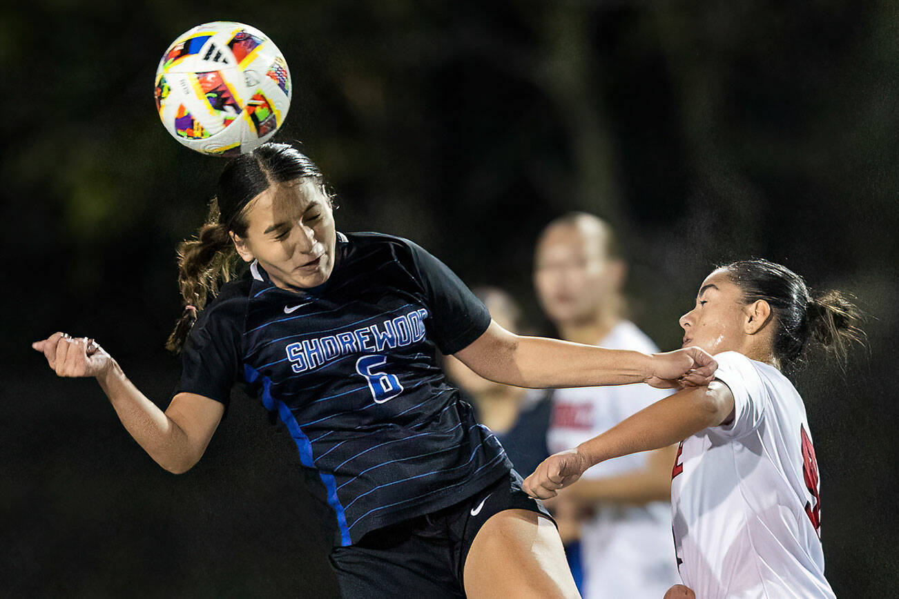 Shorewood’s Emi Barron heads the ball during the 3A district game against Mountlake Terrace on Oct. 30, 2025 in Shoreline, Washington. (Olivia Vanni / The Herald)