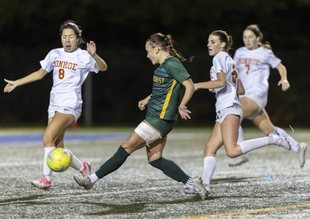 Shorecrest’s Olivia Taylor takes a shot while Monroe’s SeRi Park defends during the 3A girls district game on Nov. 4, 2025 in Shoreline, Washington. (Olivia Vanni / The Herald)
