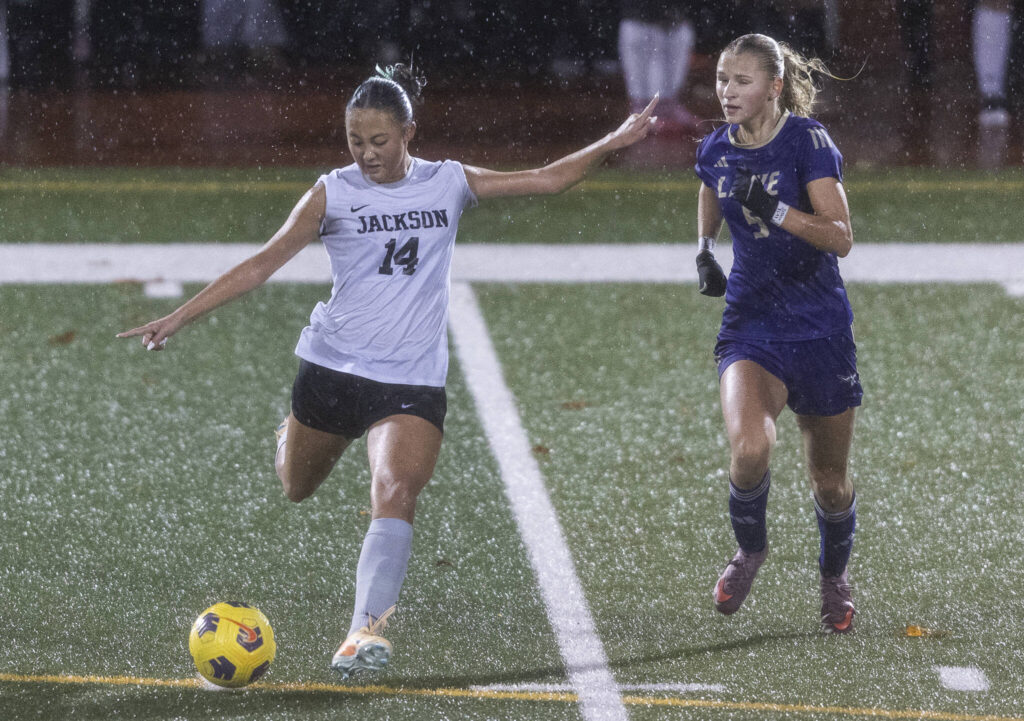 Jackson’s Mailynn Jeffries crosses the ball during the 4A girls district game against Lake Stevens on Nov. 5, 2025 in Lake Stevens, Washington. (Olivia Vanni / The Herald)
