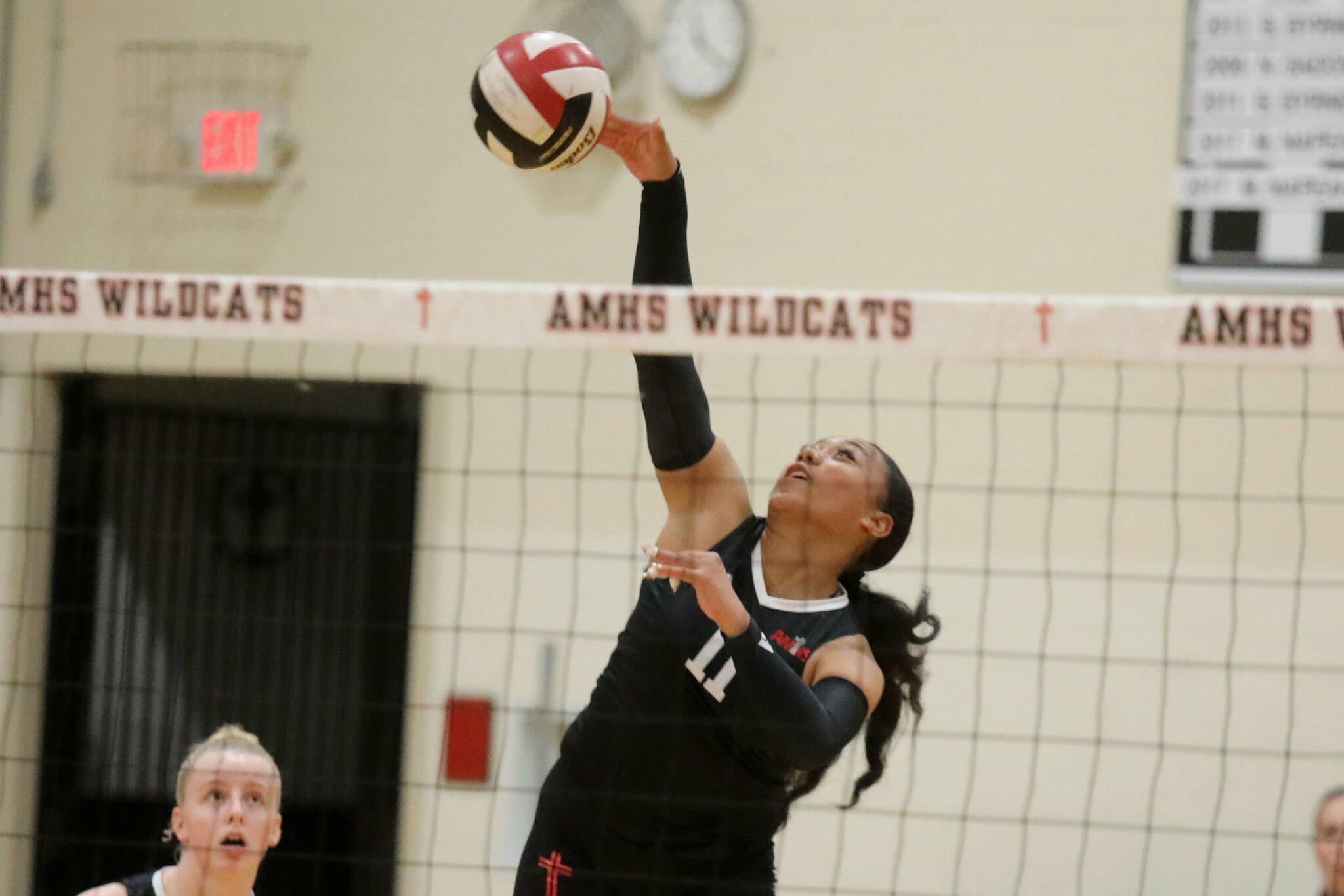 Archbishop Murphy sophomore setter/pin hitter Teuila Halalilo hits the ball in a Wesco 3A/2A South matchup against Edmonds-Woodway in Everett, Wash., on Oct. 9, 2024. The unranked Wildcats won 3-1 and handed the No. 10 Warriors their first loss of the season. (Taras McCurdie / The Herald)