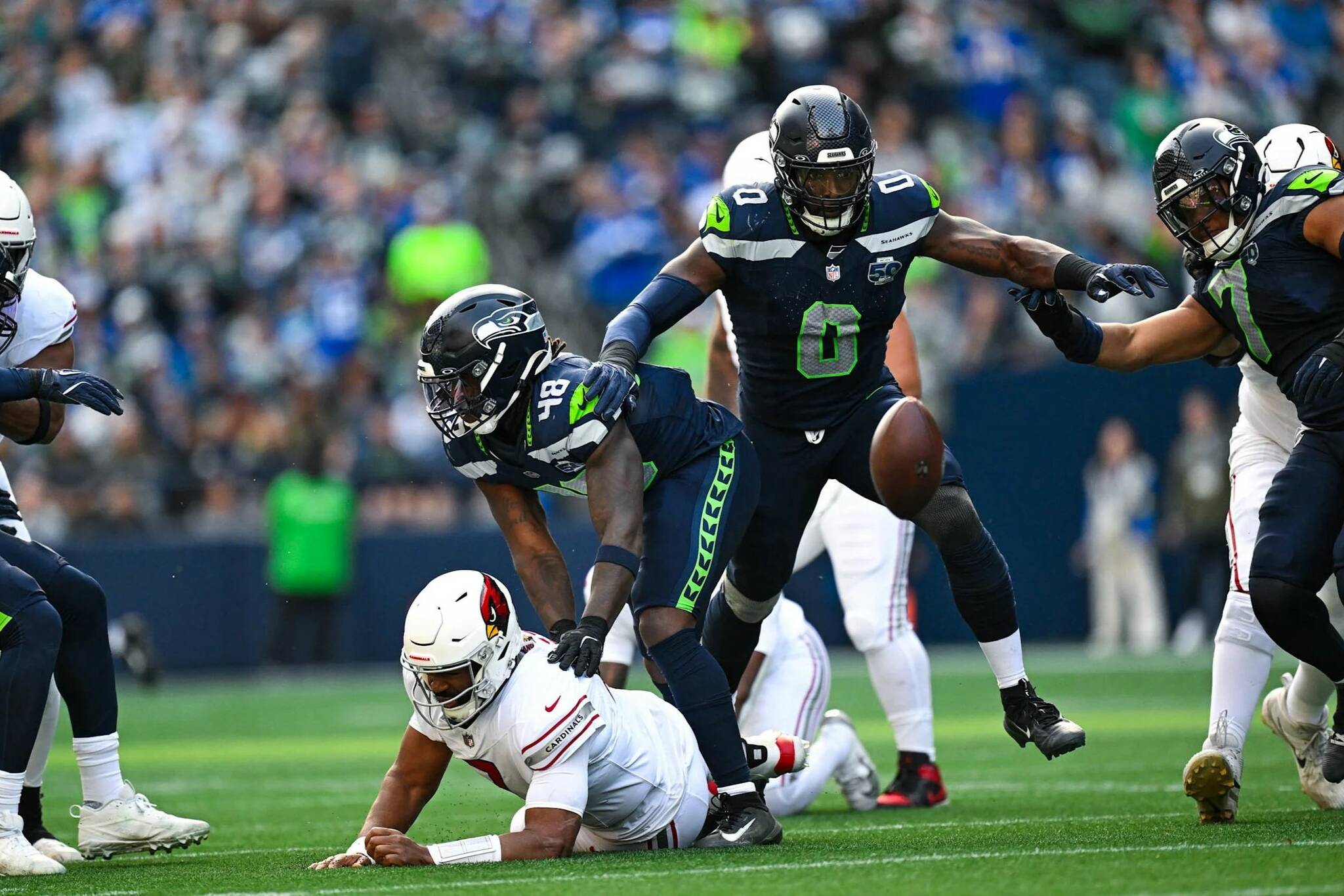 Seahawks linebacker DeMarcus Lawrence (0) prepares to recover a fumble forced by linebacker Tyrice Knight (0) in Seattles 44-22 win over the Arizona Cardinals on Sunday, Nov. 9, 2025 at Lumen Field in Seattle, Washington. (Photo courtesy of the Seattle Seahawks)