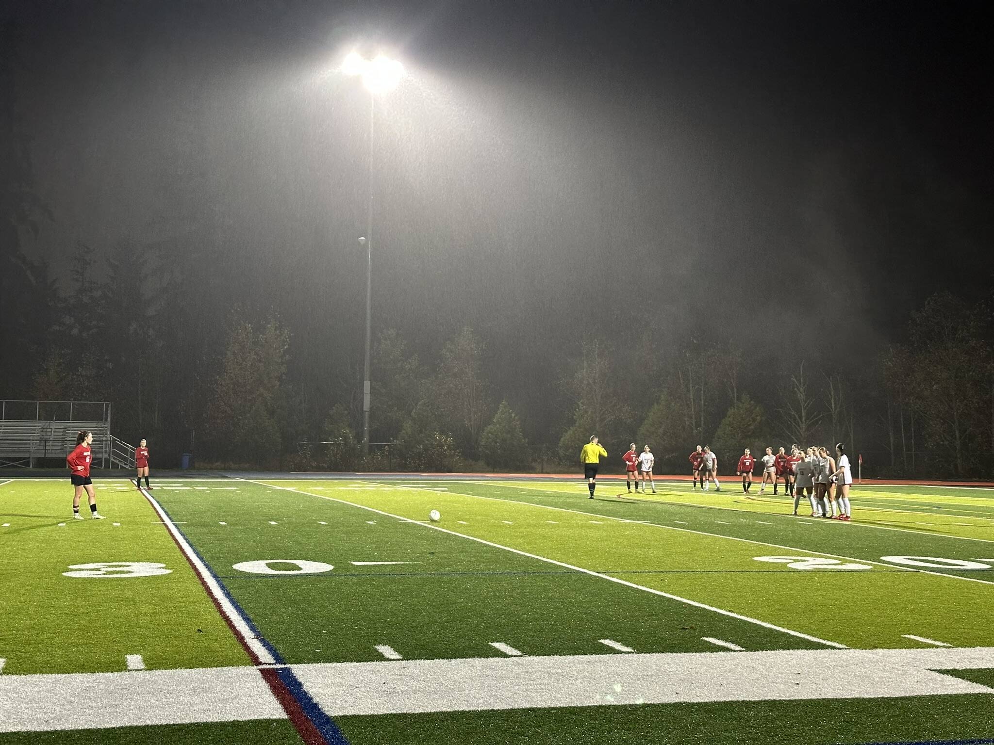 Snohomish girls soccer midfielder Lizzie Allyn prepare for a free kick during a state round of 16 game against University on Friday, Nov. 14, 2025 at Eastside Catholic High School in Sammamish. (Qasim Ali / The Herald)