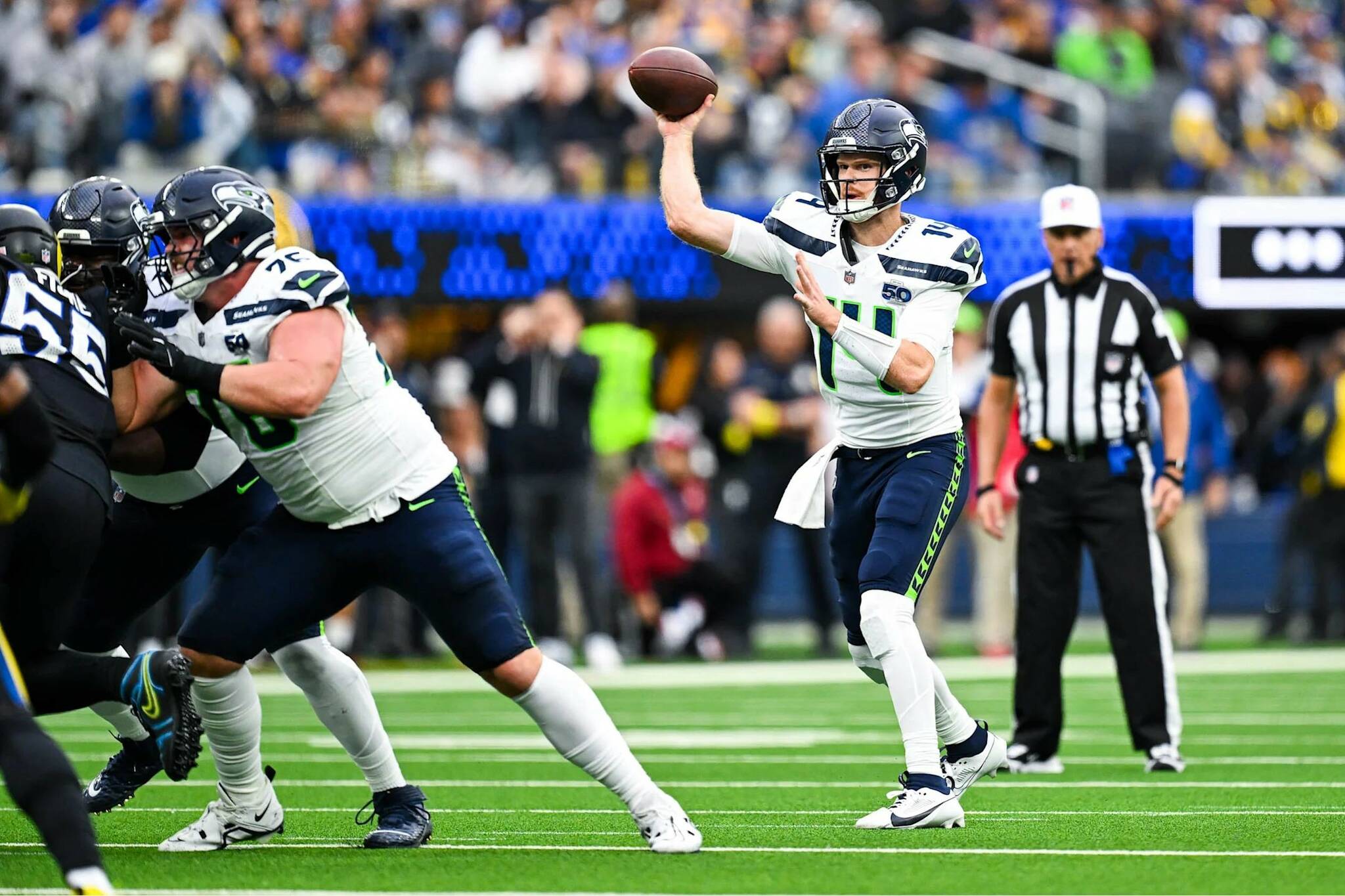 Seahawks guard Gray Zabel (76) for Sam Darnold (14) during Seattle’s game against the Los Angeles Rams at SoFi Stadium in Inglewood, California on Sunday, Nov. 16, 2025. (Photo courtesy of the Seattle Seahawks)
