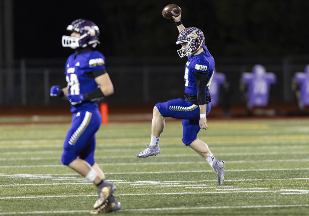Lake Stevens’ Lucas Mooring reacts to recovering the ball during an onside kick during the 4A state football quarterfinal game against Moses Lake on Nov. 22, 2025 in Lake Stevens, Washington. (Olivia Vanni / The Herald)
