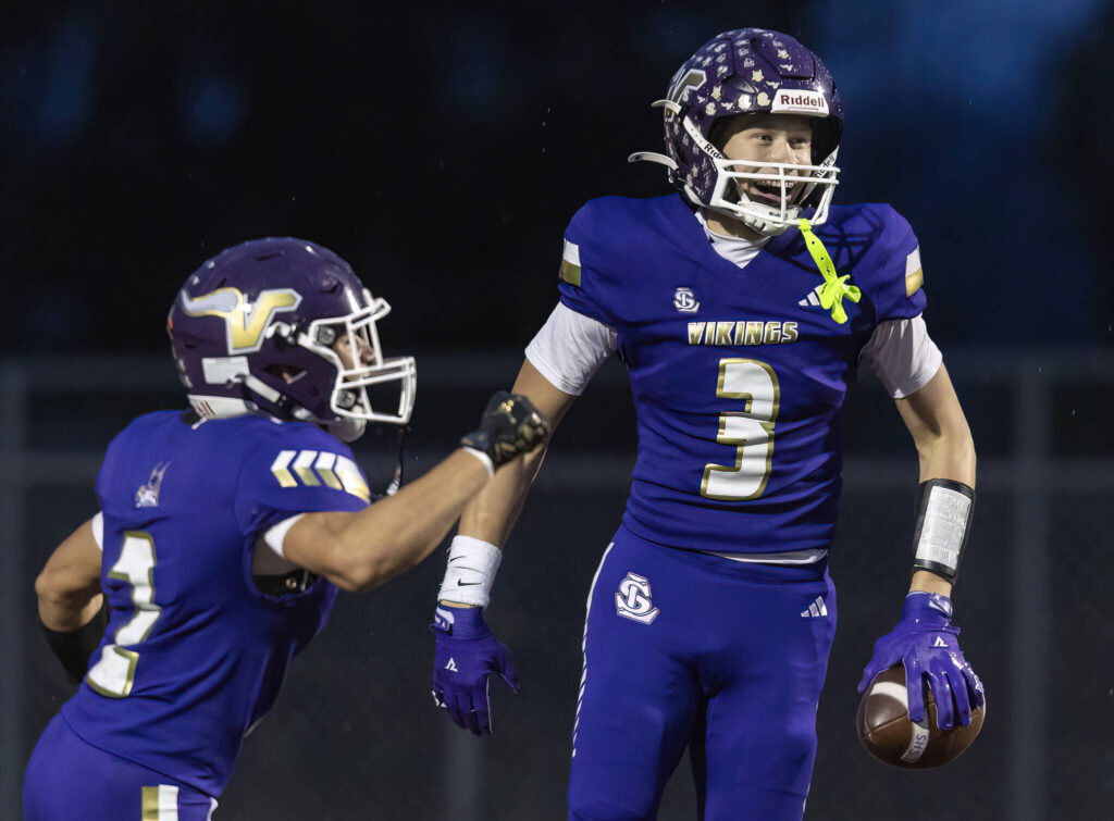 Lake Stevens’ Max Cook celebrates his touchdown during the 4A state football quarterfinal game against Moses Lake on Nov. 22, 2025 in Lake Stevens, Washington. (Olivia Vanni / The Herald)
