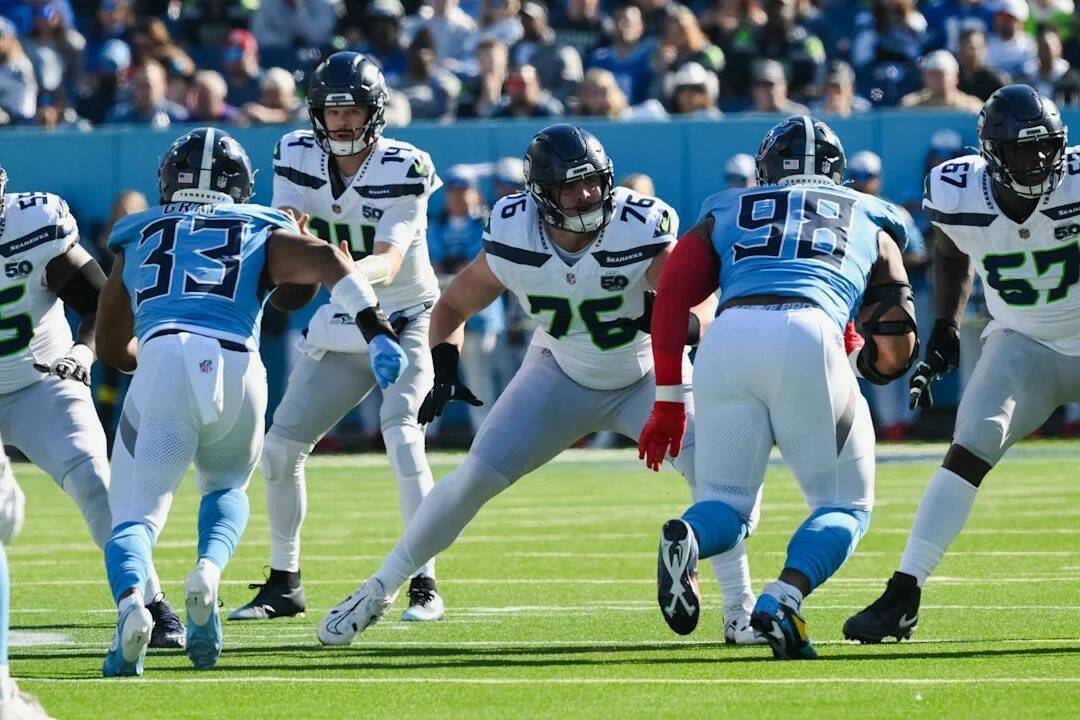 Seahawks guard Gray Zabel (76) blocks for for quarterback Sam Darnold (14) against the Tennessee Titans on Sunday. (Photo courtesy of the Seattle Seahawks)