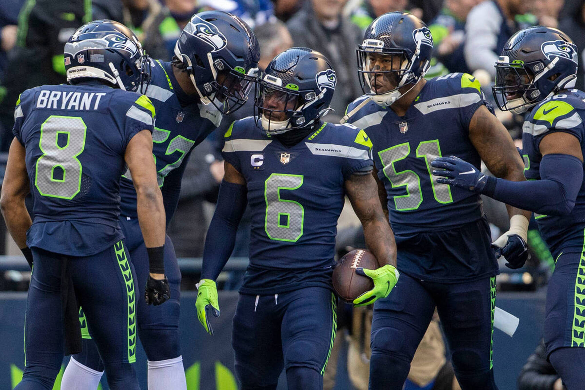 Seattle Seahawks safety Quandre Diggs (6) celebrates his interception with teammates during the first half against the Las Vegas Raiders at Lumen Field on Sunday, Nov. 27, 2022, in Seattle. (Heidi Fang / Las Vegas Review-Journal / Tribune News Services)