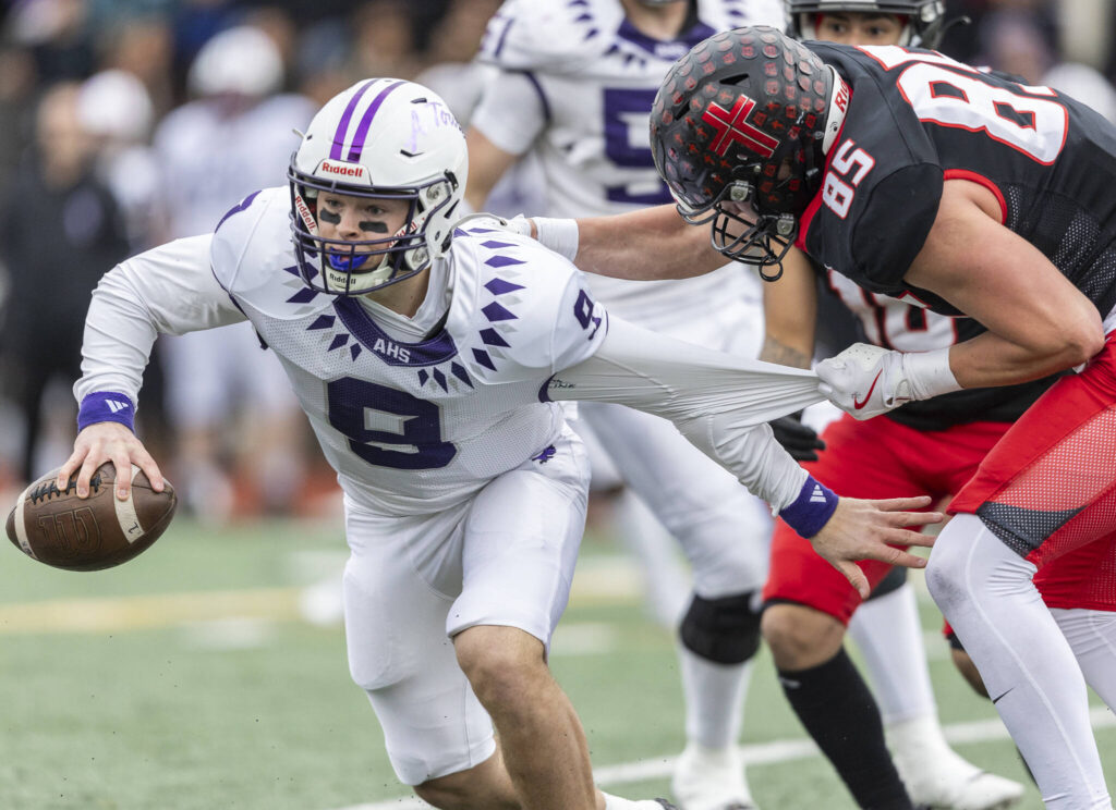 Archbishop Murphy’s Jack Sievers sacks Anacortes’ Ryan Harrington during the 2A state football semifinal game on Nov. 29, 2025 in Everett, Washington. (Olivia Vanni / The Herald)
