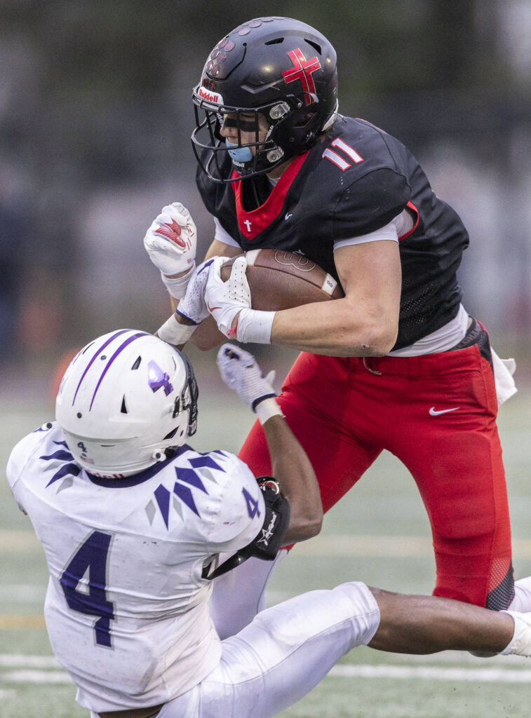 Archbishop Murphy’s Henry Gabalis shakes off a tackle during the 2A state football semifinal game against Anacortes on Nov. 29, 2025 in Everett, Washington. (Olivia Vanni / The Herald)
