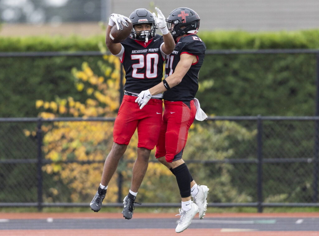 Archbishop Murphy’s Isaiah Smith celebrates his touchdown during the 2A state football semifinal game against Anacortes on Nov. 29, 2025 in Everett, Washington. (Olivia Vanni / The Herald)
