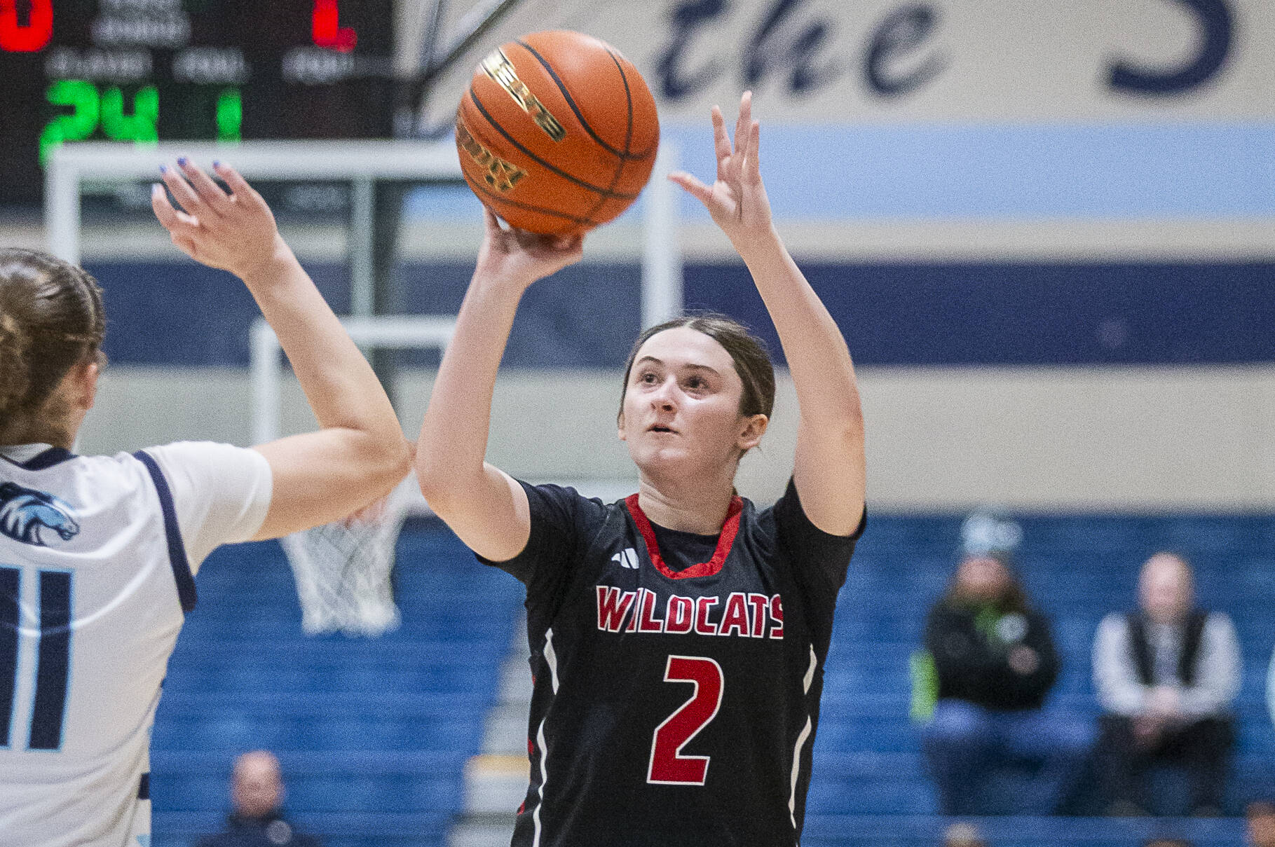 Archbishop Murphy’s Brooke Blachly makes a three point shot during the game against Meadowdale on Friday, Jan. 3, 2025 in Lynnwood, Washington. (Olivia Vanni / The Herald)