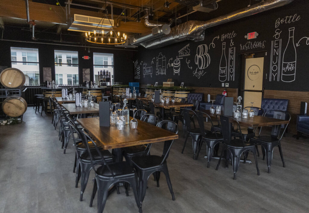 The second floor Barrel Room of the Rustic Cork Wine Bar on Dec. 2, 2025 in Everett, Washington. (Olivia Vanni / The Herald)
