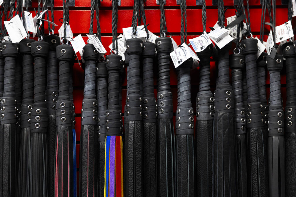 A selection of leather whips available at Lovers Lair on Dec. 19, 2025 in Everett. (Olivia Vanni / The Herald)
