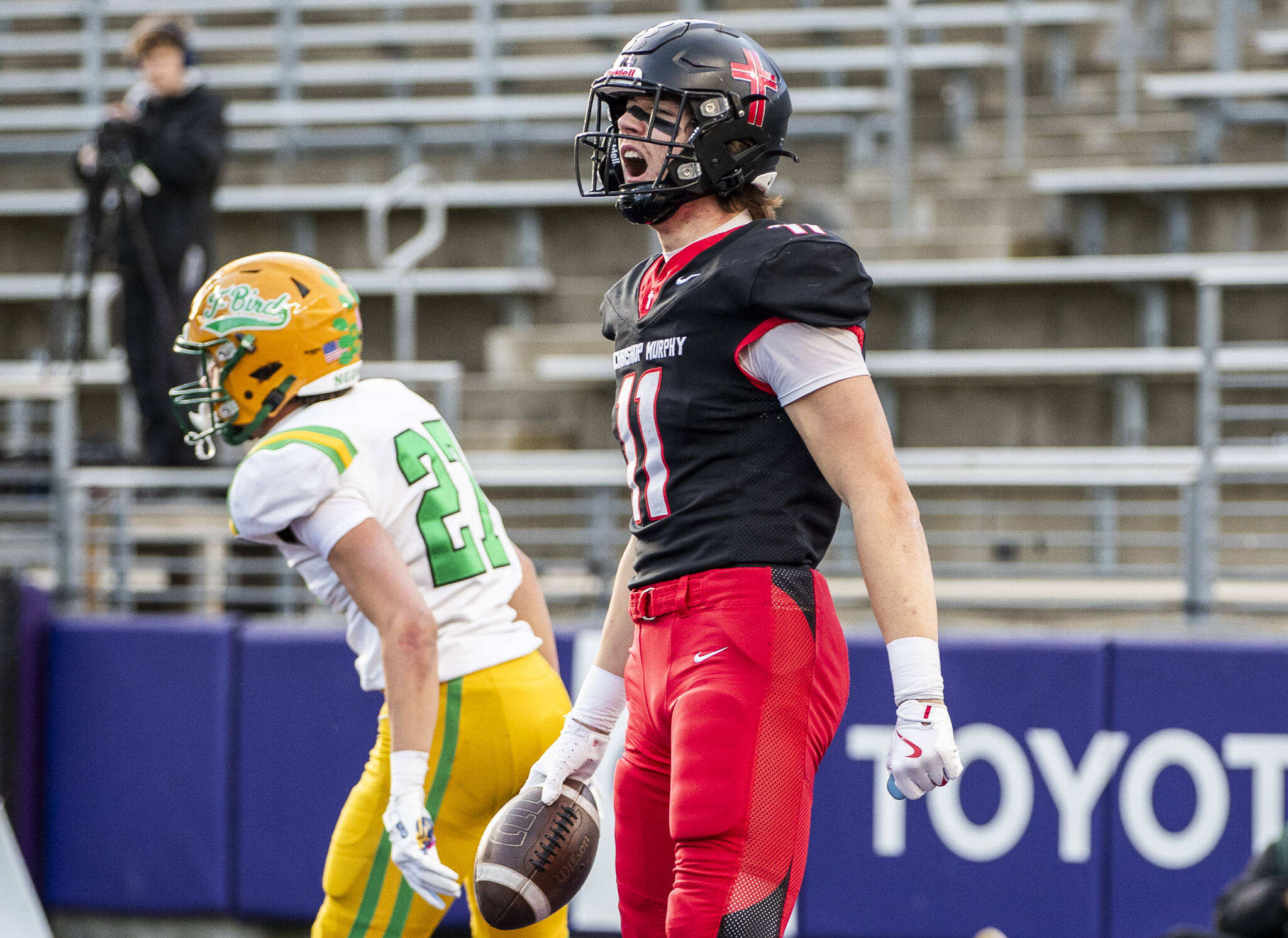 Archbishop Murphys Henry Gabalis yells after scoring a touchdown during the 2A state championship game against Tumwater at Husky Stadium on Saturday, Dec. 6, 2025 in Seattle, Washington. (Olivia Vanni / The Herald)