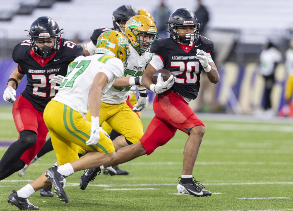 Archbishop Murphy&rsquo;s Isaiah Smith runs the ball during the 2A state championship game against Tumwater at Husky Stadium on Saturday, Dec. 6, 2025 in Seattle, Washington. (Olivia Vanni / The Herald)
