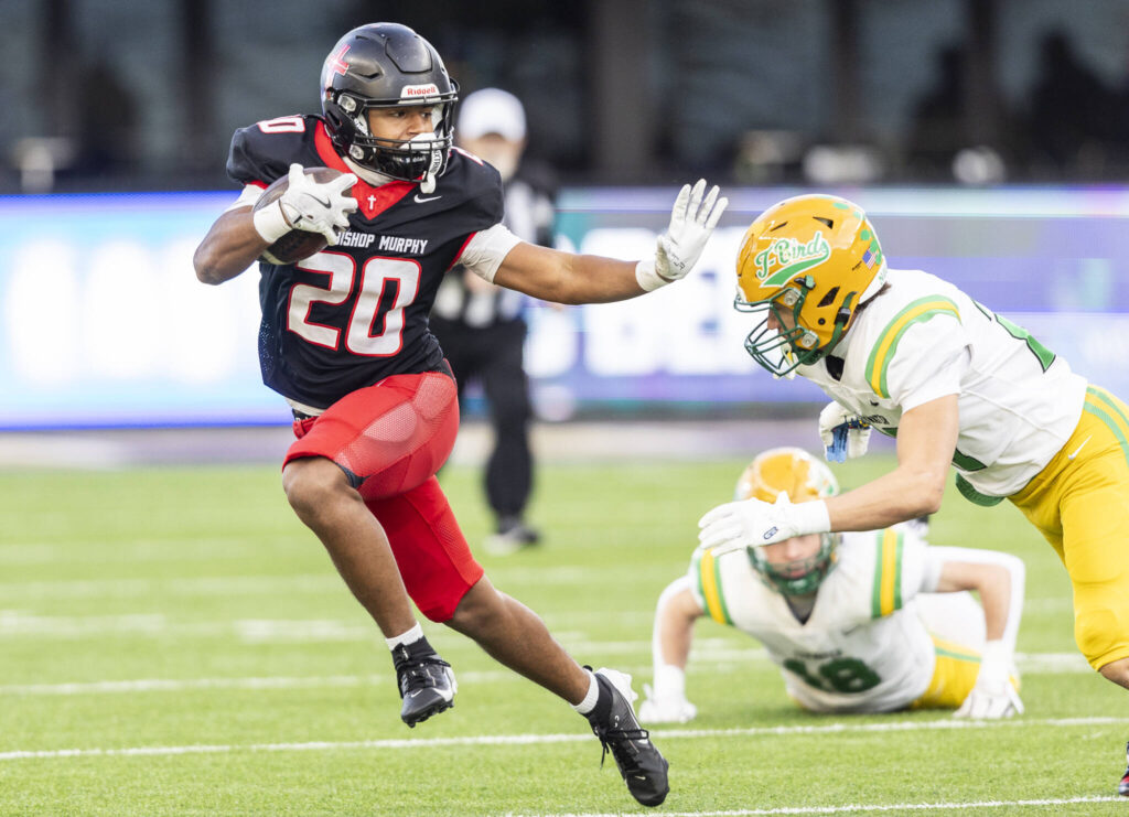Archbishop Murphy&rsquo;s Isaiah Smith runs the ball during the 2A state championship game against Tumwater at Husky Stadium on Saturday, Dec. 6, 2025 in Seattle, Washington. (Olivia Vanni / The Herald)
