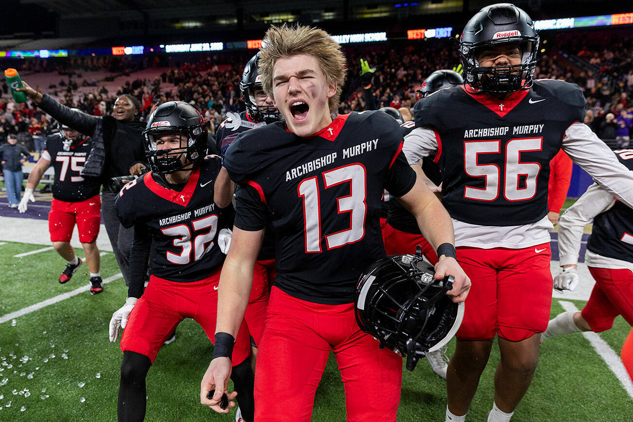 Archbishop Murphy’s EJ Manning yells after winning the 2A state championship game against Tumwater at Husky Stadium on Saturday, Dec. 6, 2025 in Seattle, Washington. (Olivia Vanni / The Herald)