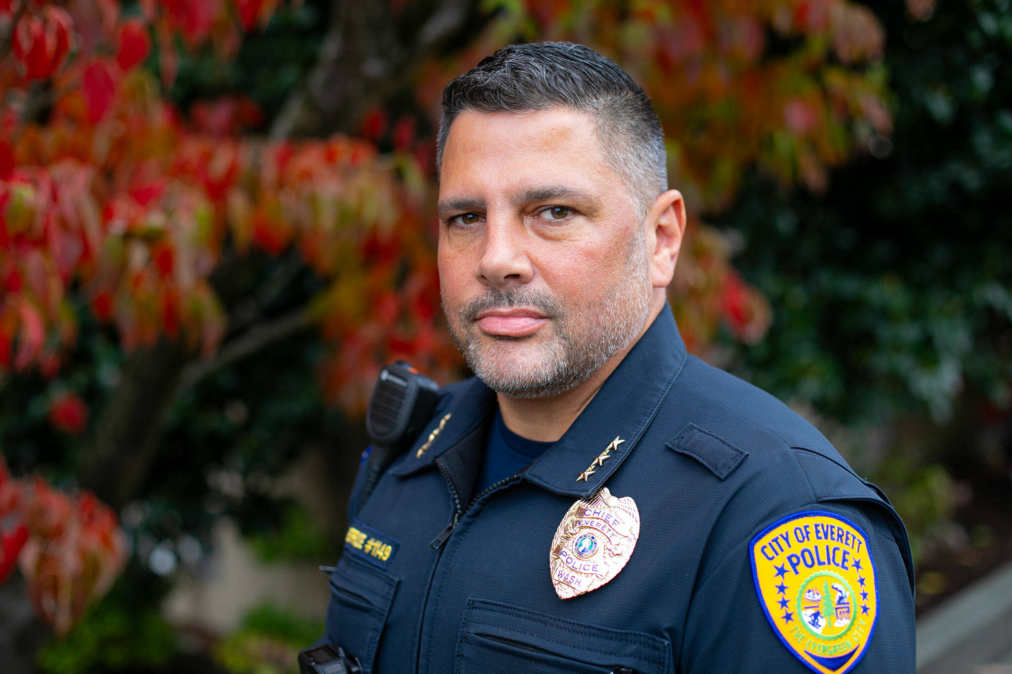 New Everett Police Chief John DeRousse stands in front of the department’s north precinct Thursday, Nov. 9, 2023, in downtown Everett, Washington. (Ryan Berry / The Herald)