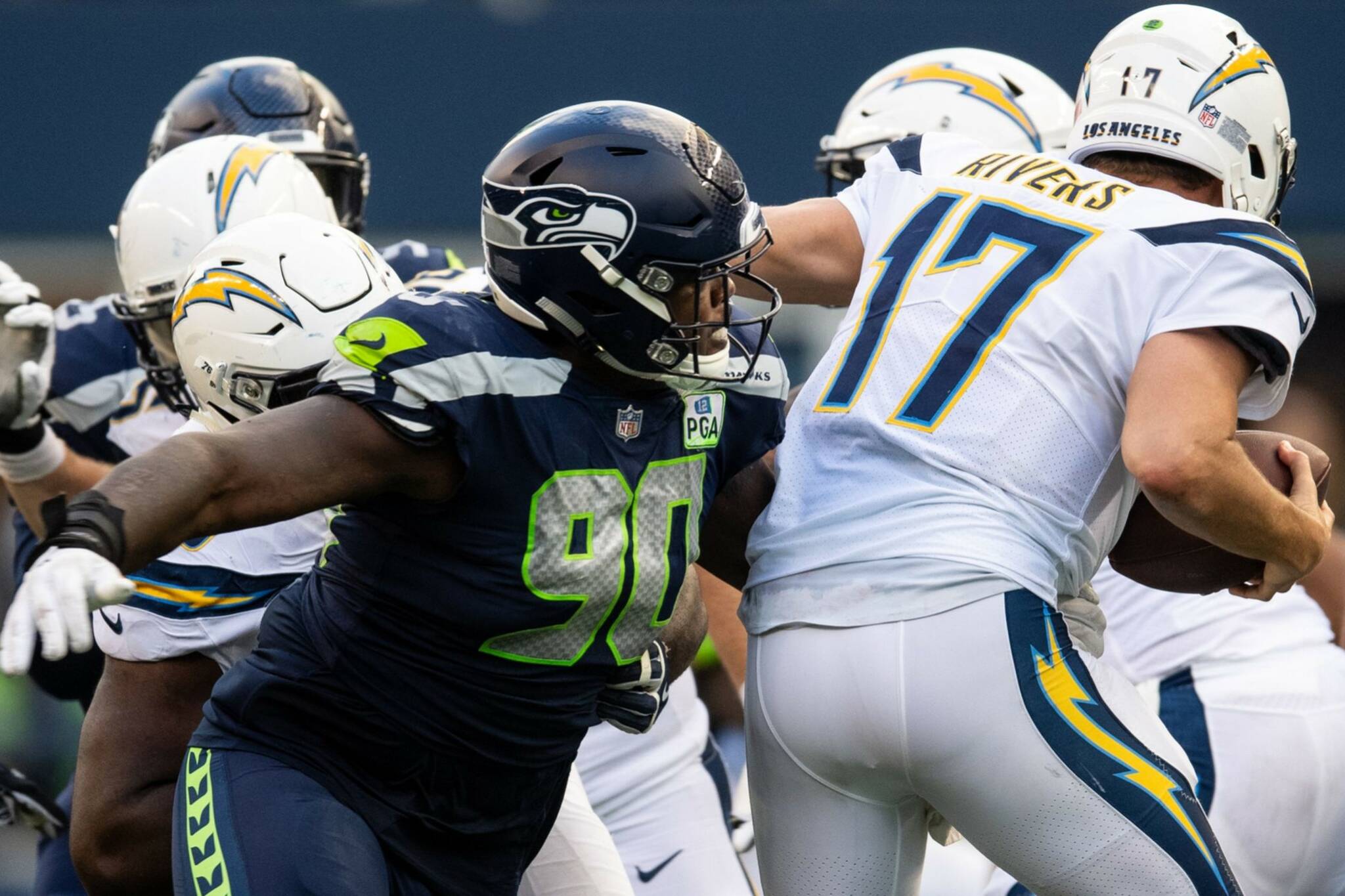 Seahawks defensive lineman Jarran Reed closes in on quarterback Philip Rivers during a game in 2018. (Photo courtesy of the Seattle Seahawks)