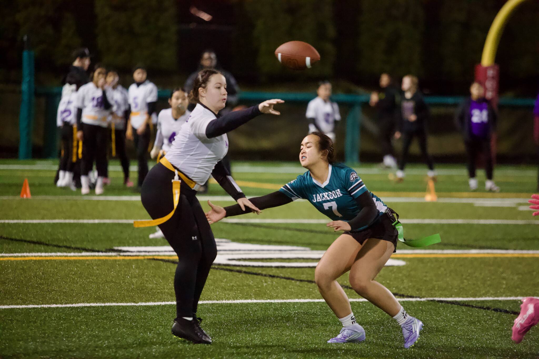 Jackson junior Jaelyn Phaysith pressures Highline's quarterback into a throwaway during the Timberwolves' 23-7 win against the Pirates at Pop Keeney Stadium on Dec. 11, 2025. (Joe Pohoryles / The Herald)